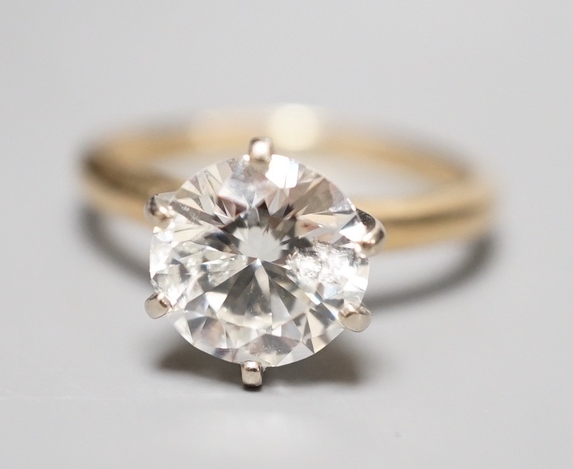 A 14k yellow metal and solitaire diamond ring, the stone weighing 2.04ct, size J/K, gross weight 3.1 grams